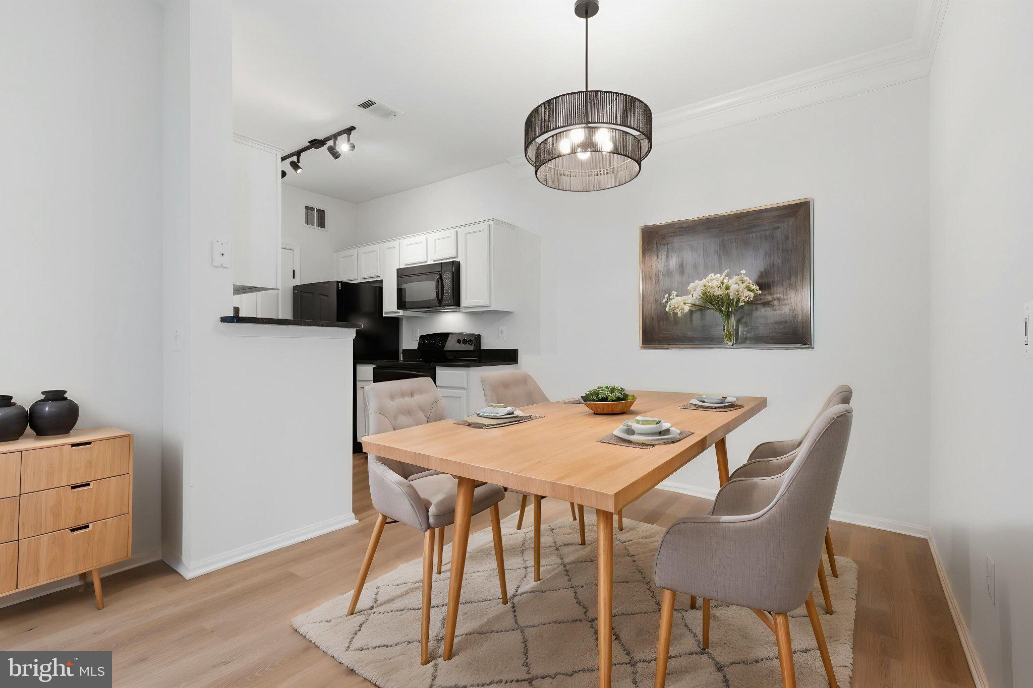1580 Spring Gate Dr., Unit 4303 McLean, VA 22102 - Photo 3 of 41 Modern dining space with elegant charm.