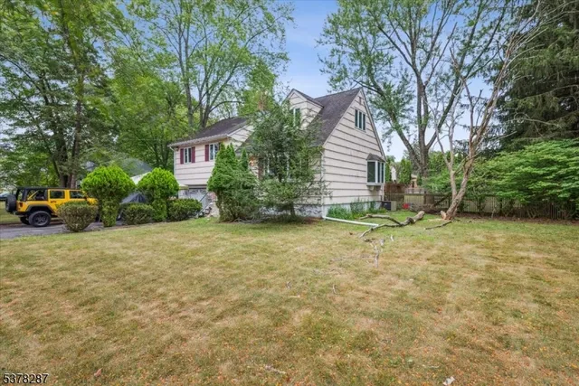 a house with trees in front of it