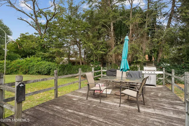 a view of a chairs and table in the patio