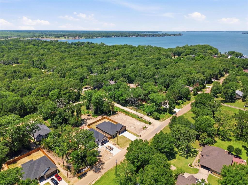 435 Waterboard Road Trinidad, TX 75163 - Photo 39 of 39 Aerial perspective of a verdant landscape featuring a prominent body of water