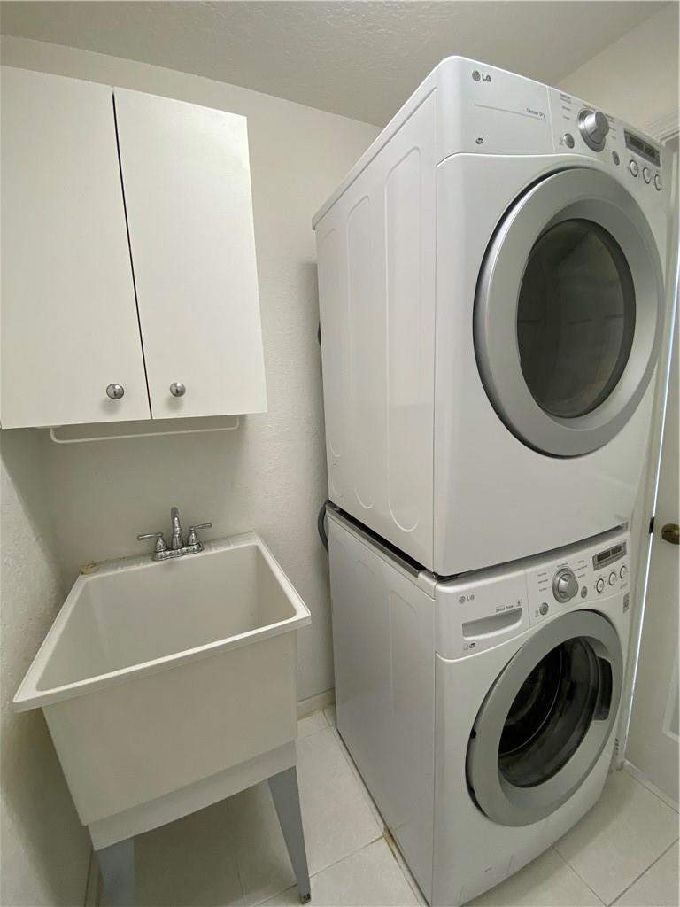 22911 Royal Crown Terrace Boca Raton, FL 33433 - Photo 16 of 18 a utility room with dryer and washer
