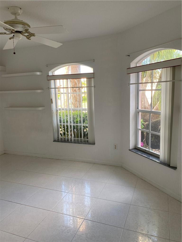 22911 Royal Crown Terrace Boca Raton, FL 33433 - Photo 2 of 18 a view of an empty room with a window