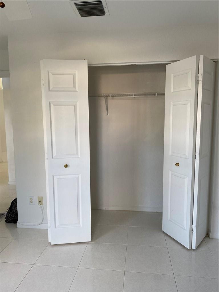22911 Royal Crown Terrace Boca Raton, FL 33433 - Photo 3 of 18 a view of an empty room