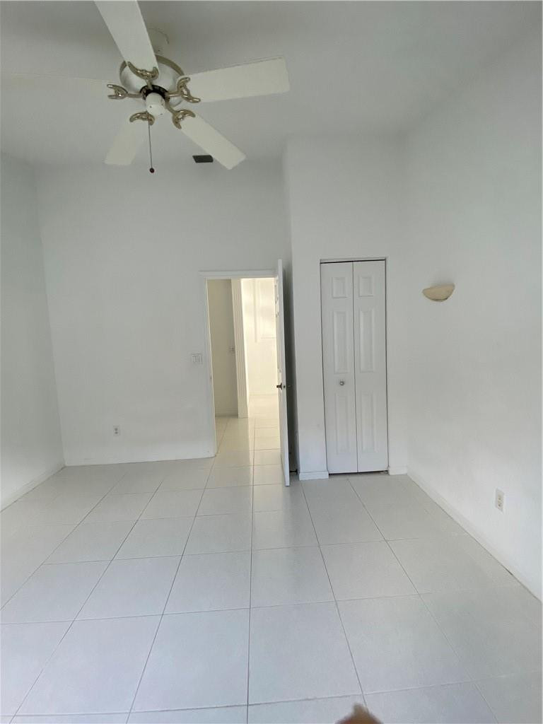 22911 Royal Crown Terrace Boca Raton, FL 33433 - Photo 4 of 18 a view of an empty room
