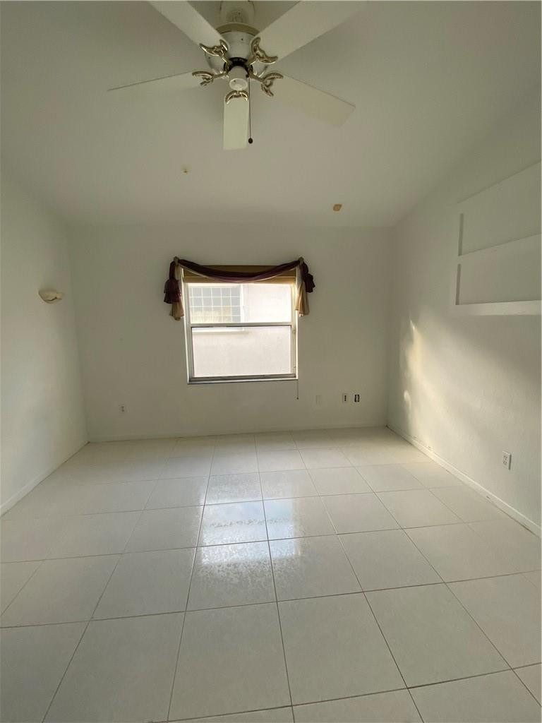22911 Royal Crown Terrace Boca Raton, FL 33433 - Photo 5 of 18 a view of a garage