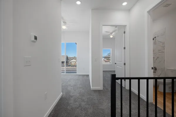a bathroom with a granite countertop sink and vanity