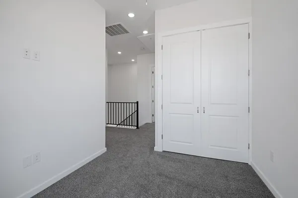 a view of kitchen and wooden floor