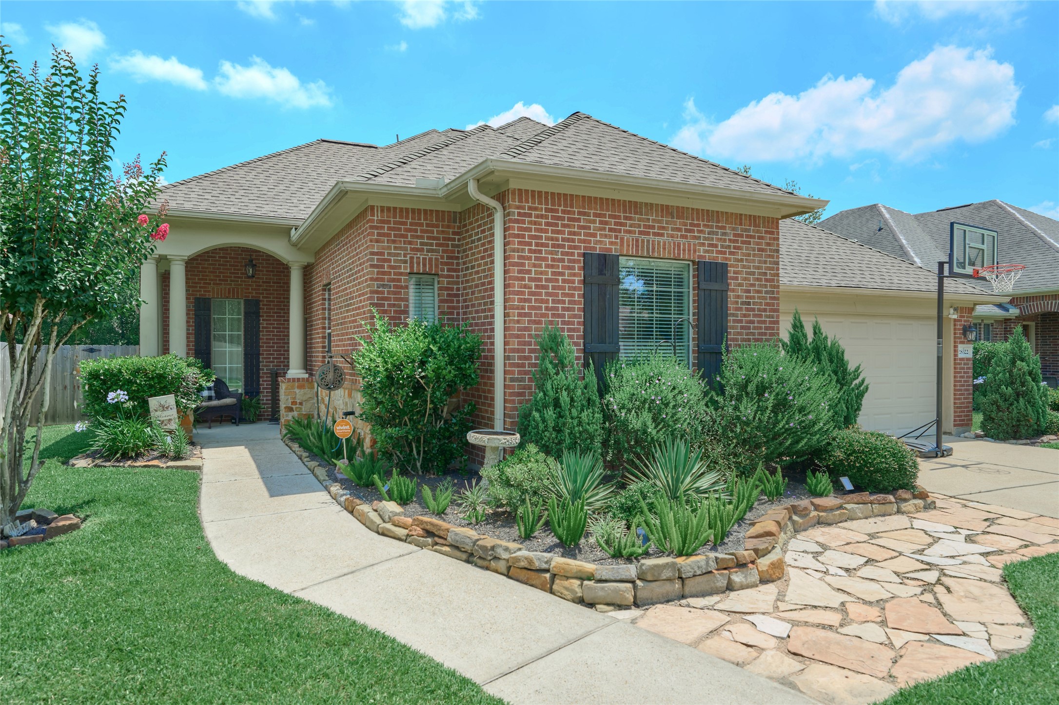 28322 Madelin Manor Lane Spring, TX 77386 - Photo 1 of 46 a front view of a house with a yard