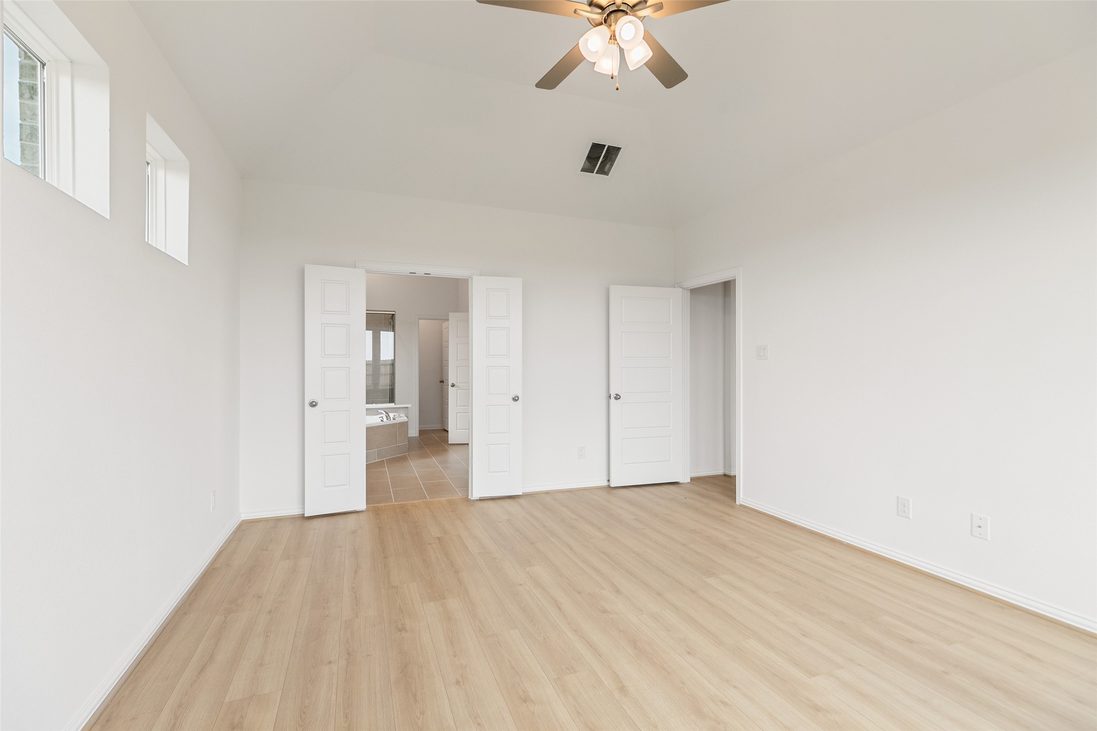 2805 Ruby Laurel Drive Iowa Colony, TX 77583 - Photo 22 of 39 a view of a room with wooden floor and carpet
