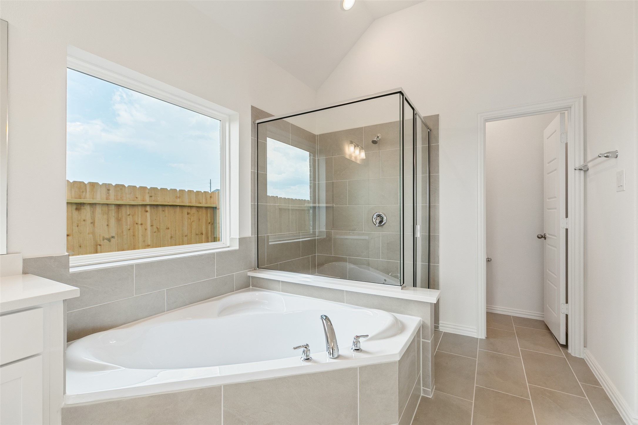2805 Ruby Laurel Drive Iowa Colony, TX 77583 - Photo 24 of 39 a white bath tub sitting next to a window