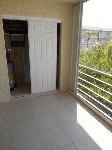 an empty room with sliding door