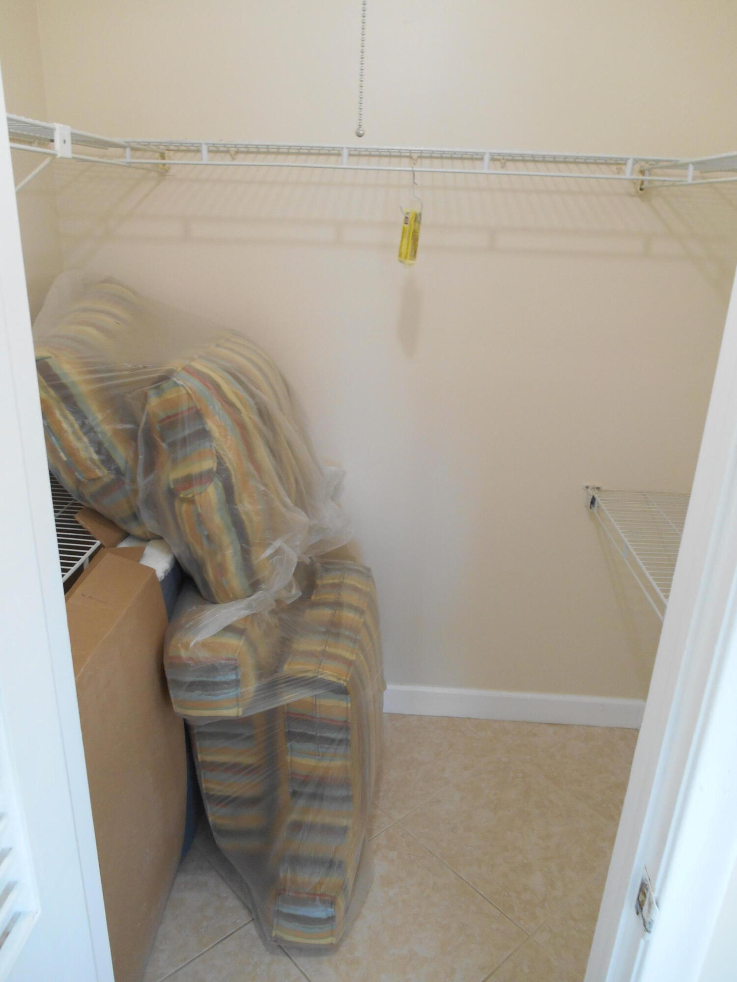 2615 Northeast 1st Court, Unit 301 Boynton Beach, FL 33435 - Photo 23 of 40 a view of walk in closet