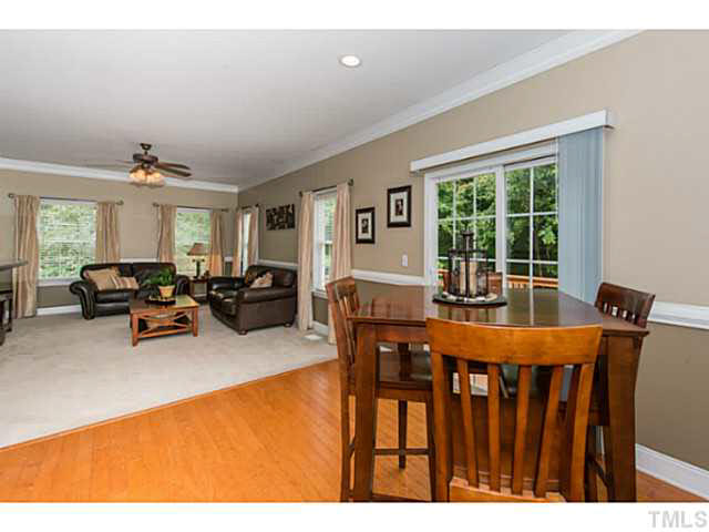 1205 Red Brick Road Garner, NC 27529 - Photo 7 of 19 a view of a dining room with furniture window and outside view
