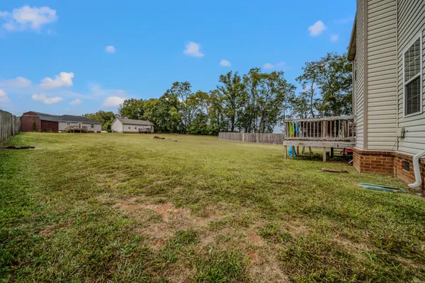 a view of a field with an outdoor space
