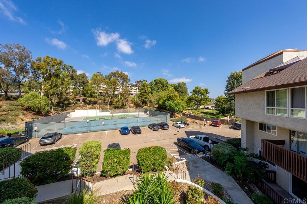 6131 Rancho Mission Road, Unit 211 San Diego, CA 92108 - Photo 17 of 21 a view of a swimming pool with a patio