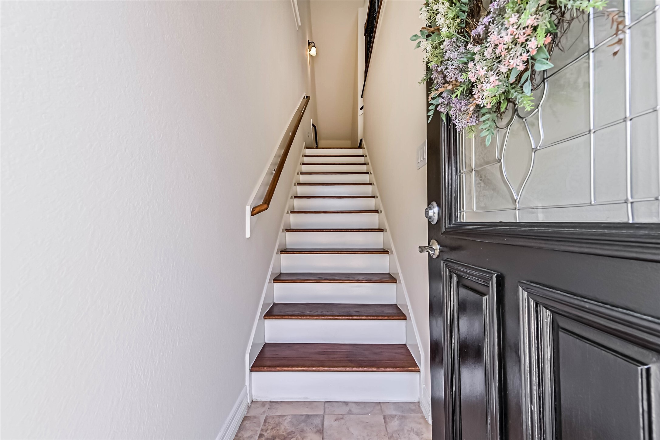 3208 Clearview Circle Houston, TX 77025 - Photo 6 of 30 a view of entryway with wooden floor and a front door