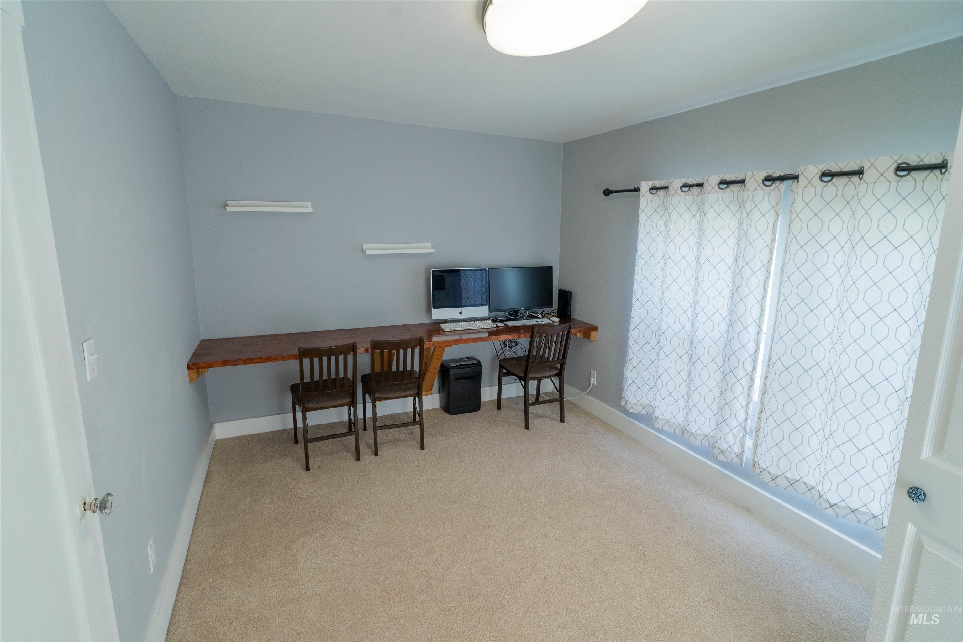 1212 14th Street Lewiston, ID 83501 - Photo 24 of 50 Home office featuring light carpet and baseboards
