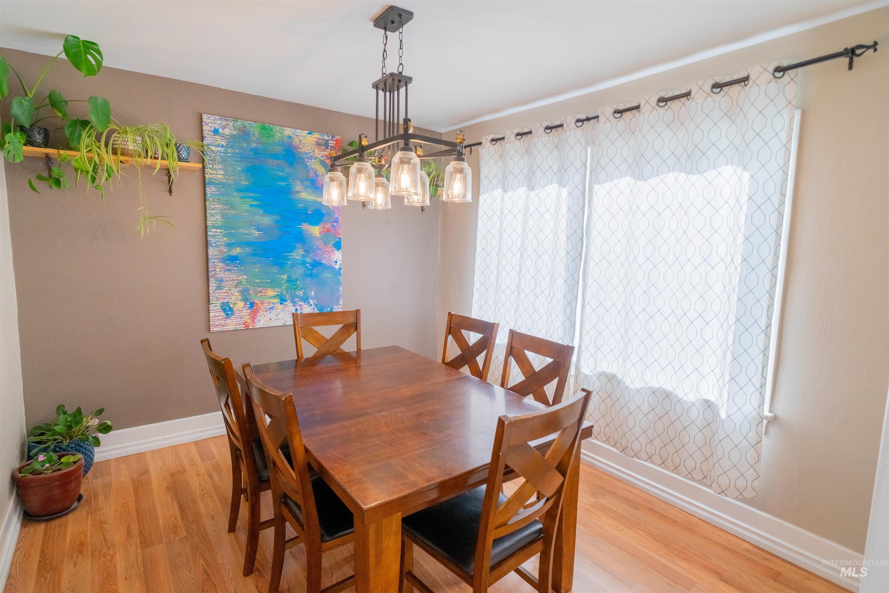 1212 14th Street Lewiston, ID 83501 - Photo 9 of 50 Dining room featuring baseboards and light wood finished floors