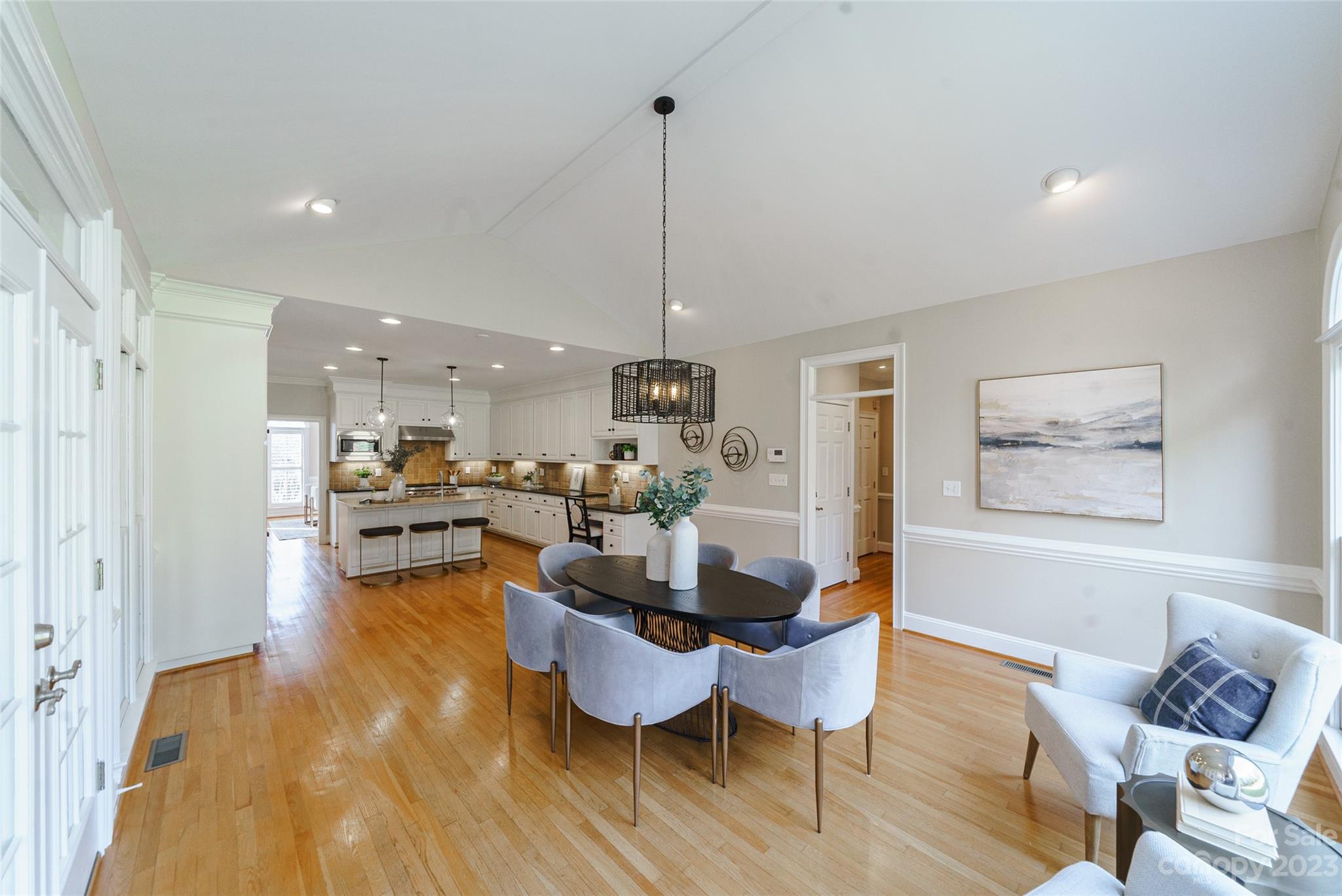 2134 Glade Hill Road Charlotte, NC 28270 - Photo 12 of 48 a dining room with furniture and wooden floor