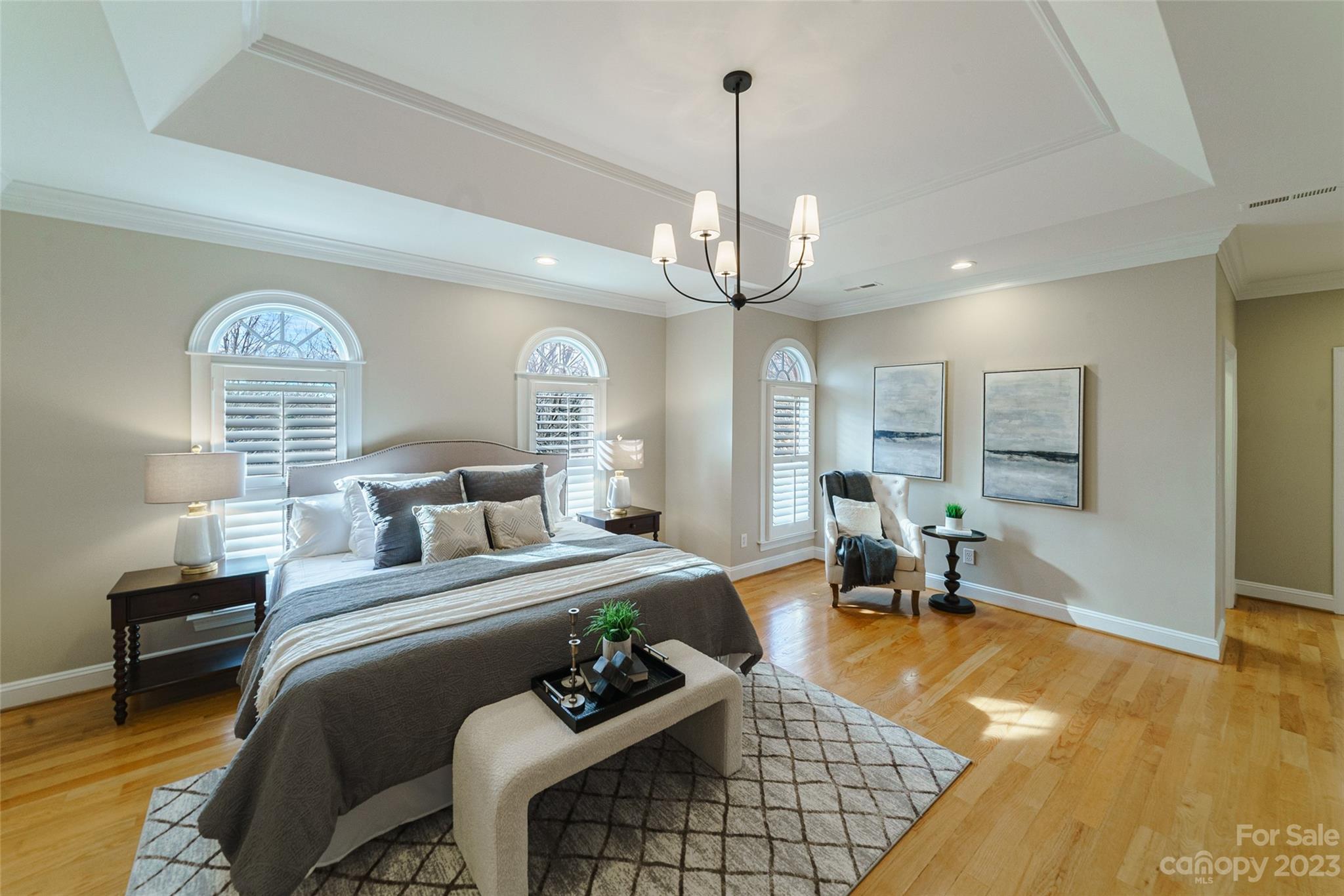 2134 Glade Hill Road Charlotte, NC 28270 - Photo 21 of 48 a living room with furniture a dining table and a chandelier
