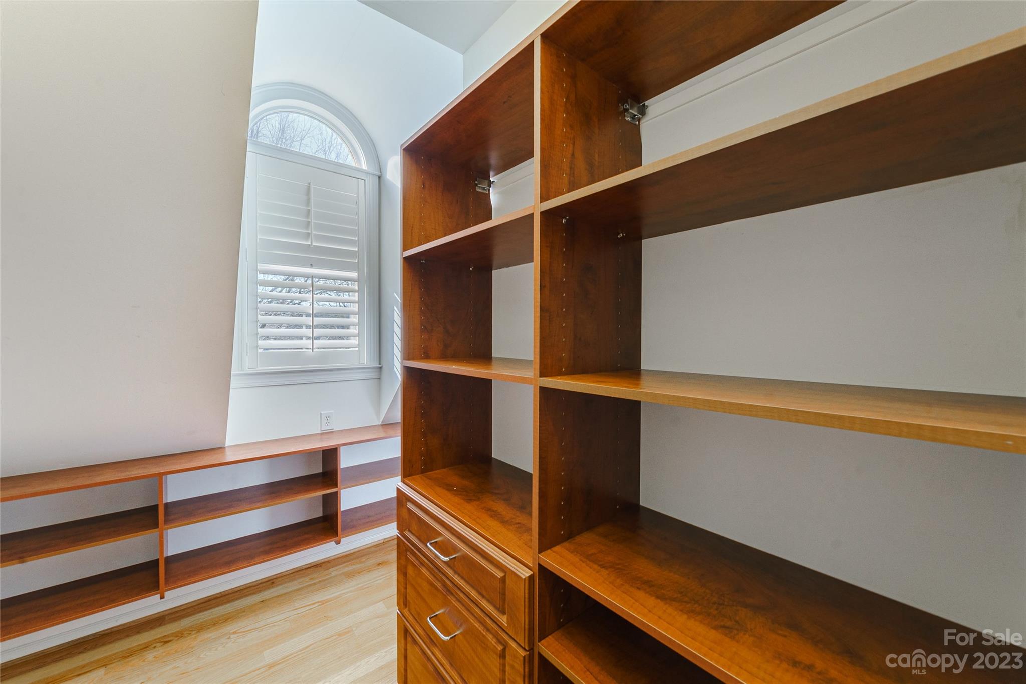2134 Glade Hill Road Charlotte, NC 28270 - Photo 30 of 48 a view of walk in closet with empty racks