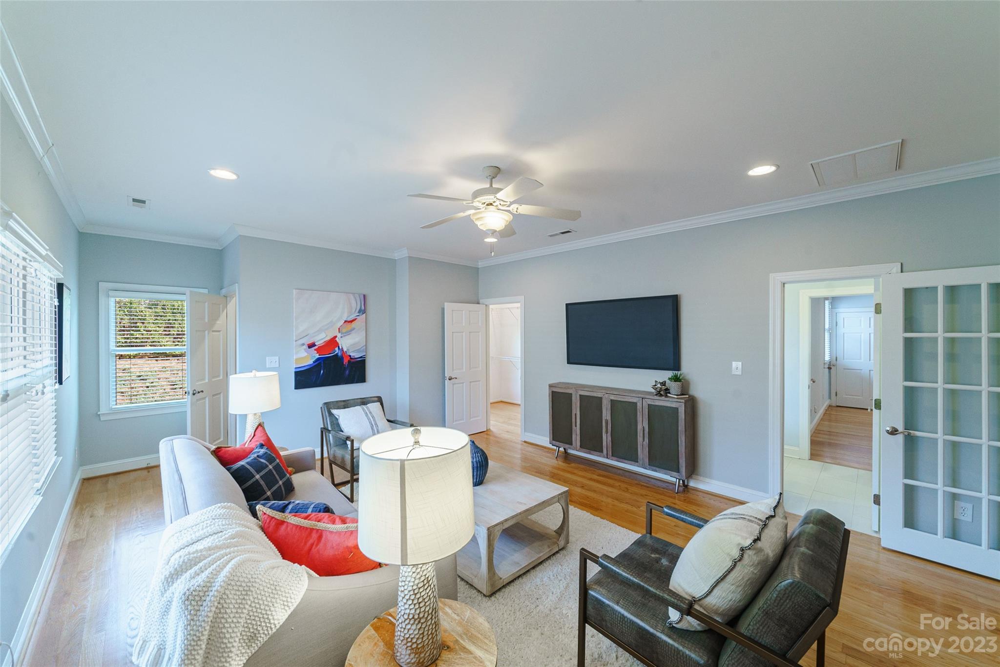 2134 Glade Hill Road Charlotte, NC 28270 - Photo 32 of 48 a living room with furniture and a flat screen tv