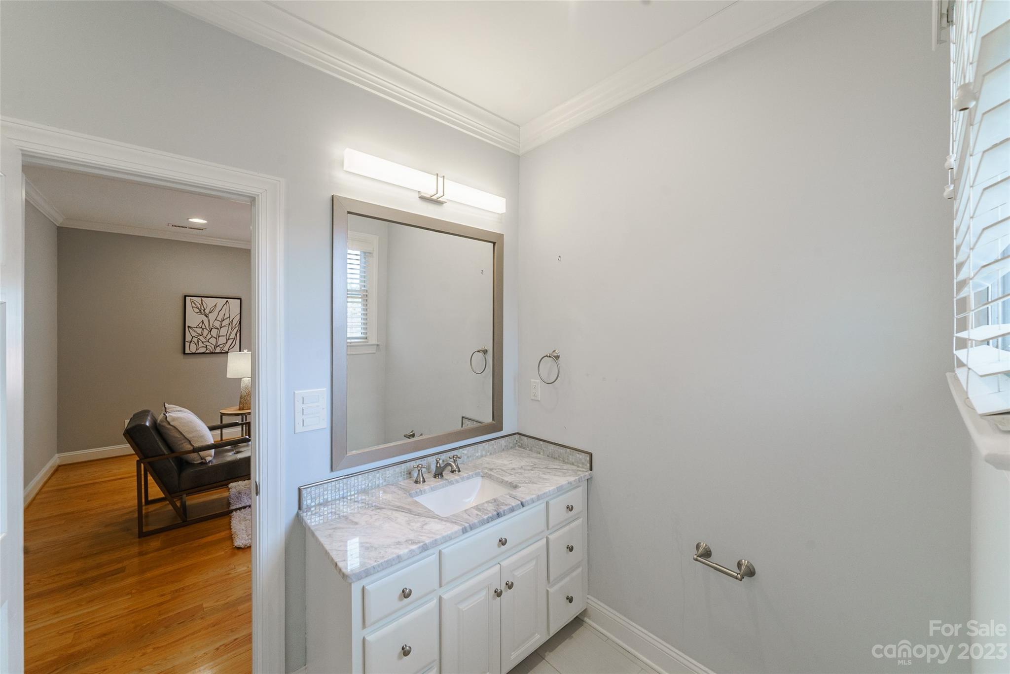 2134 Glade Hill Road Charlotte, NC 28270 - Photo 36 of 48 a bathroom with a granite countertop sink and a mirror