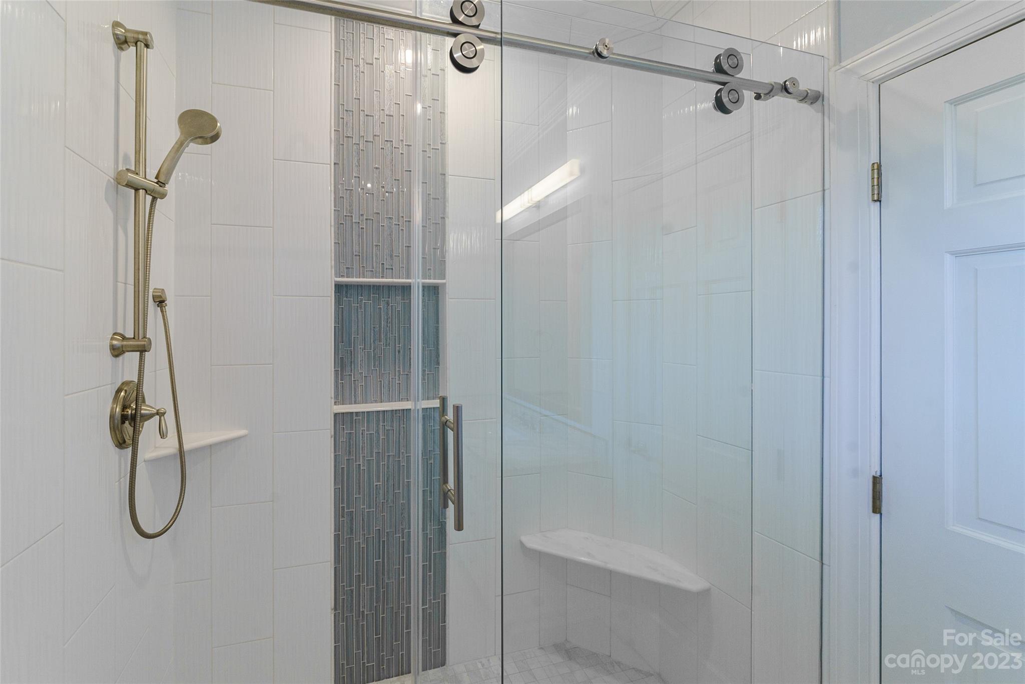 2134 Glade Hill Road Charlotte, NC 28270 - Photo 37 of 48 a bathroom with a glass shower door