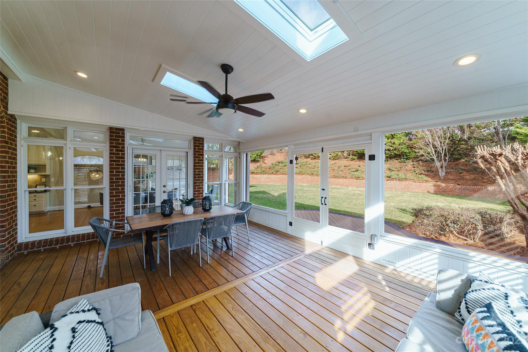 2134 Glade Hill Road Charlotte, NC 28270 - Photo 42 of 48 a living room with furniture large windows and wooden floor