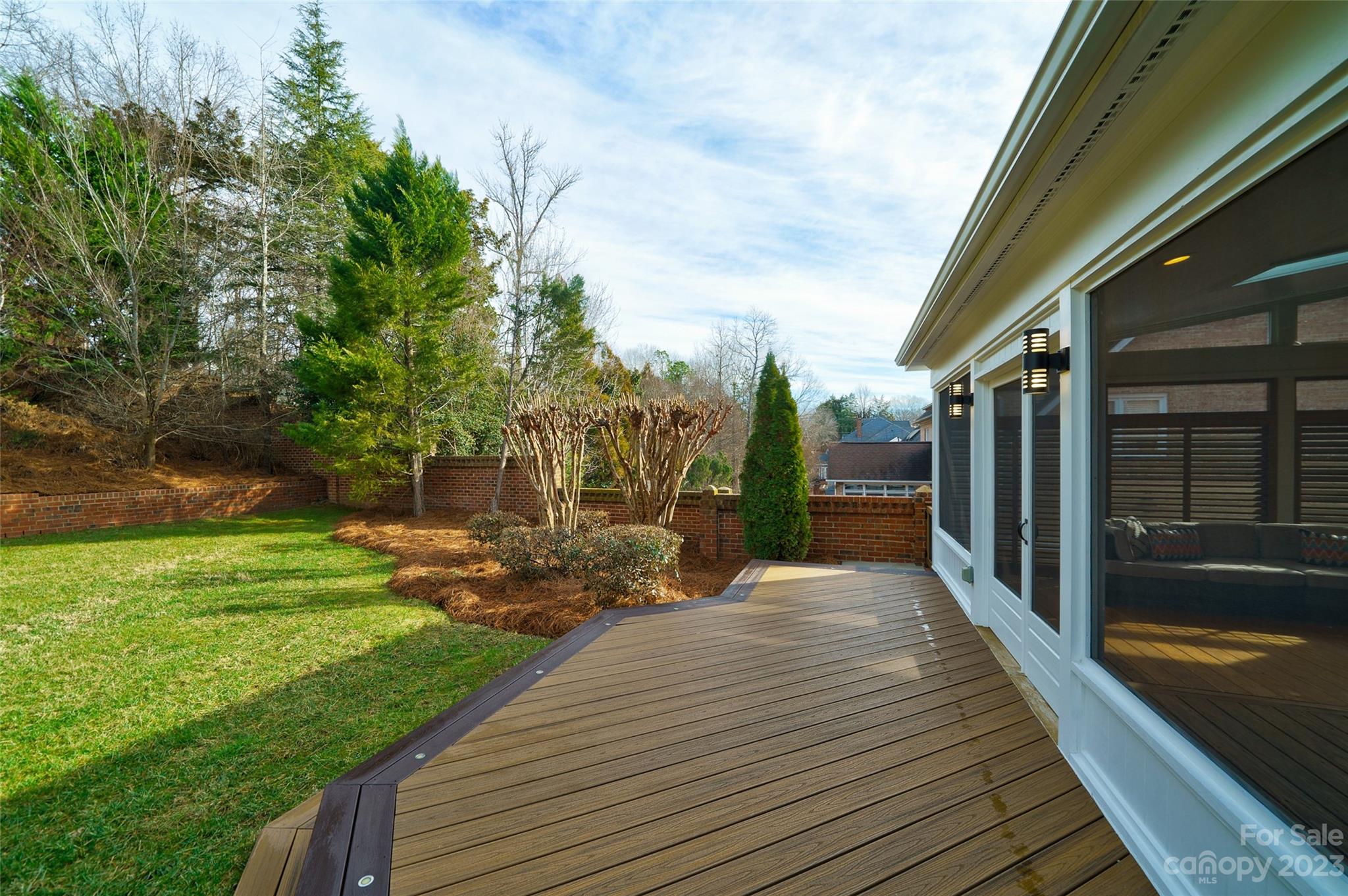 2134 Glade Hill Road Charlotte, NC 28270 - Photo 44 of 48 a patio with table and chairs and potted plants