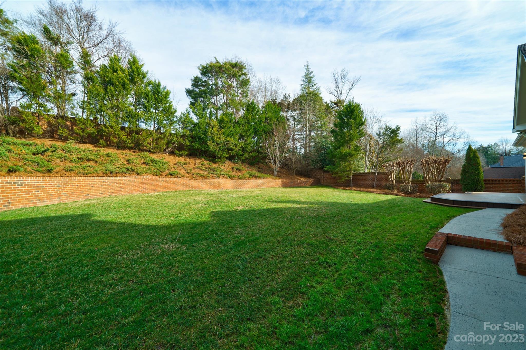 2134 Glade Hill Road Charlotte, NC 28270 - Photo 46 of 48 a view of a field of grass and trees