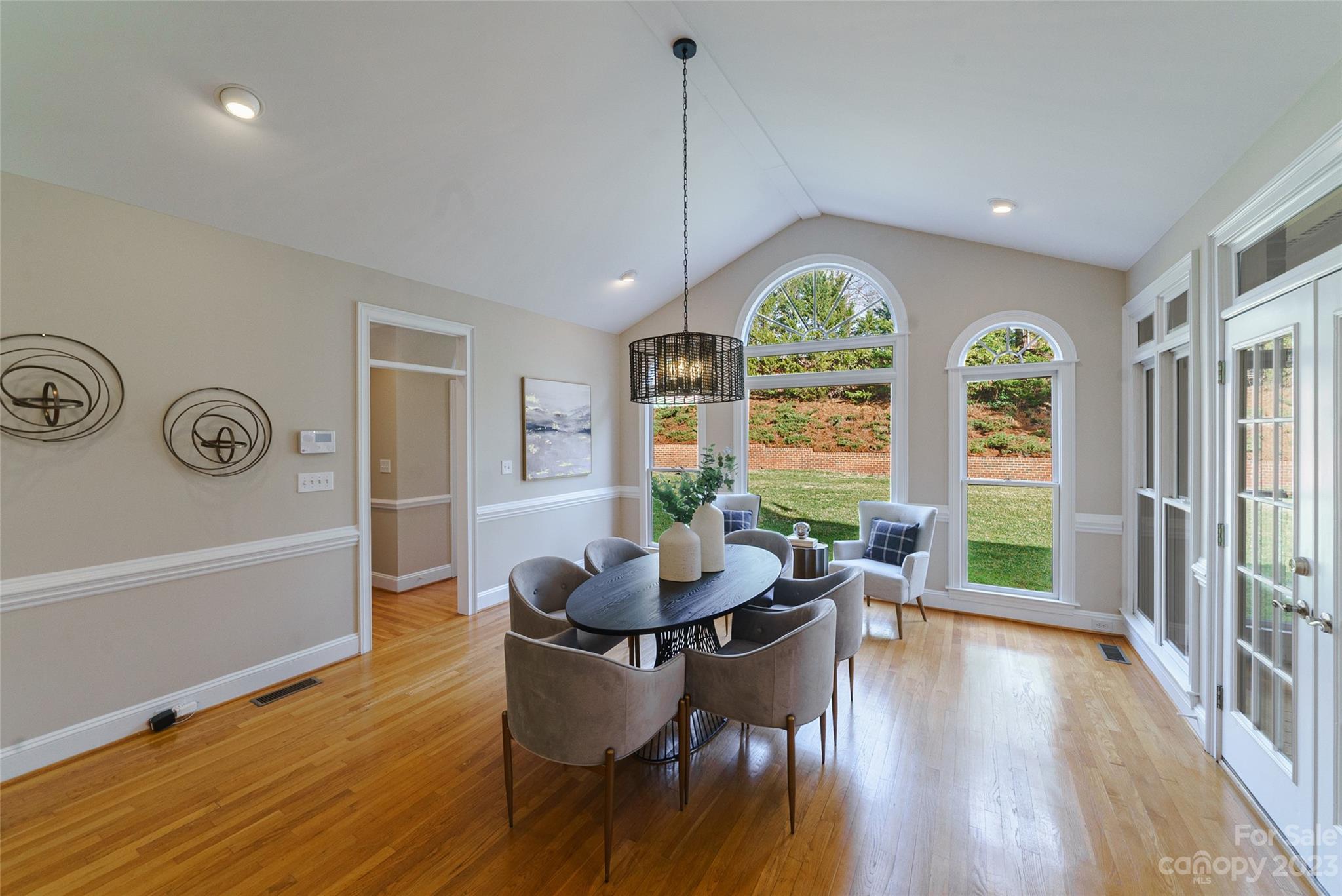 2134 Glade Hill Road Charlotte, NC 28270 - Photo 9 of 48 a dining room with furniture window wooden floor