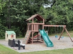 176 Maple Avenue, Unit 3 25 Rutland, MA 01543 - Photo 14 of 16 a view of playground with a slide and swing