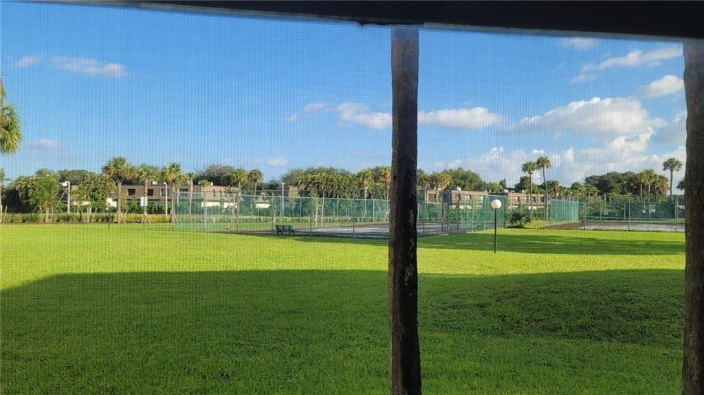 9273 Southwest 8th Street, Unit 109 Boca Raton, FL 33428 - Photo 13 of 20 a view of building with outdoor space