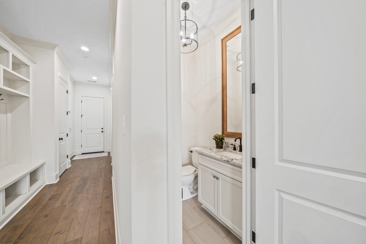 3358 Hidden Bend Lane Collierville, TN 38017 - Photo 16 of 32 a hallway with white cabinets and sink