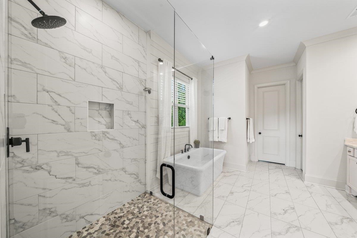 3358 Hidden Bend Lane Collierville, TN 38017 - Photo 19 of 32 a spacious bathroom with a toilet sink and shower