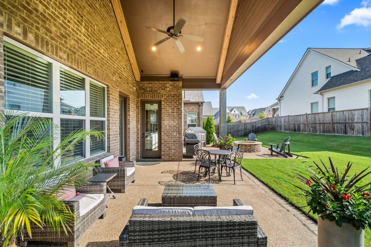 3358 Hidden Bend Lane Collierville, TN 38017 - Photo 32 of 32 a view of a patio with couches and potted plants