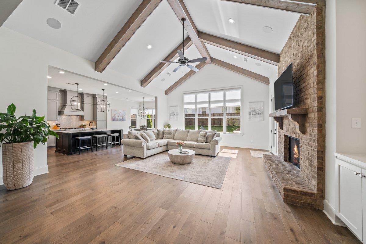 3358 Hidden Bend Lane Collierville, TN 38017 - Photo 8 of 32 a living room with furniture and a fireplace