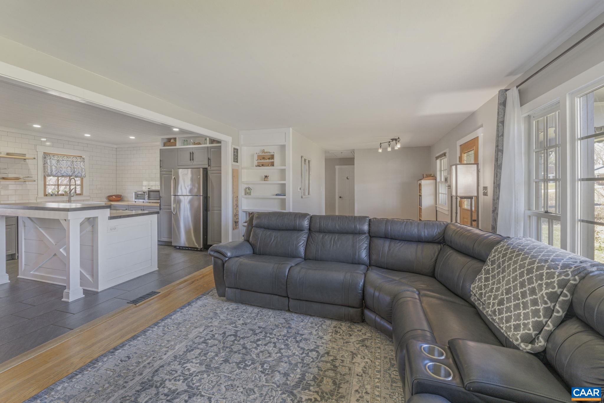 286 Madison Road Stanardsville, VA 22973 - Photo 13 of 48 a living room with furniture and kitchen view