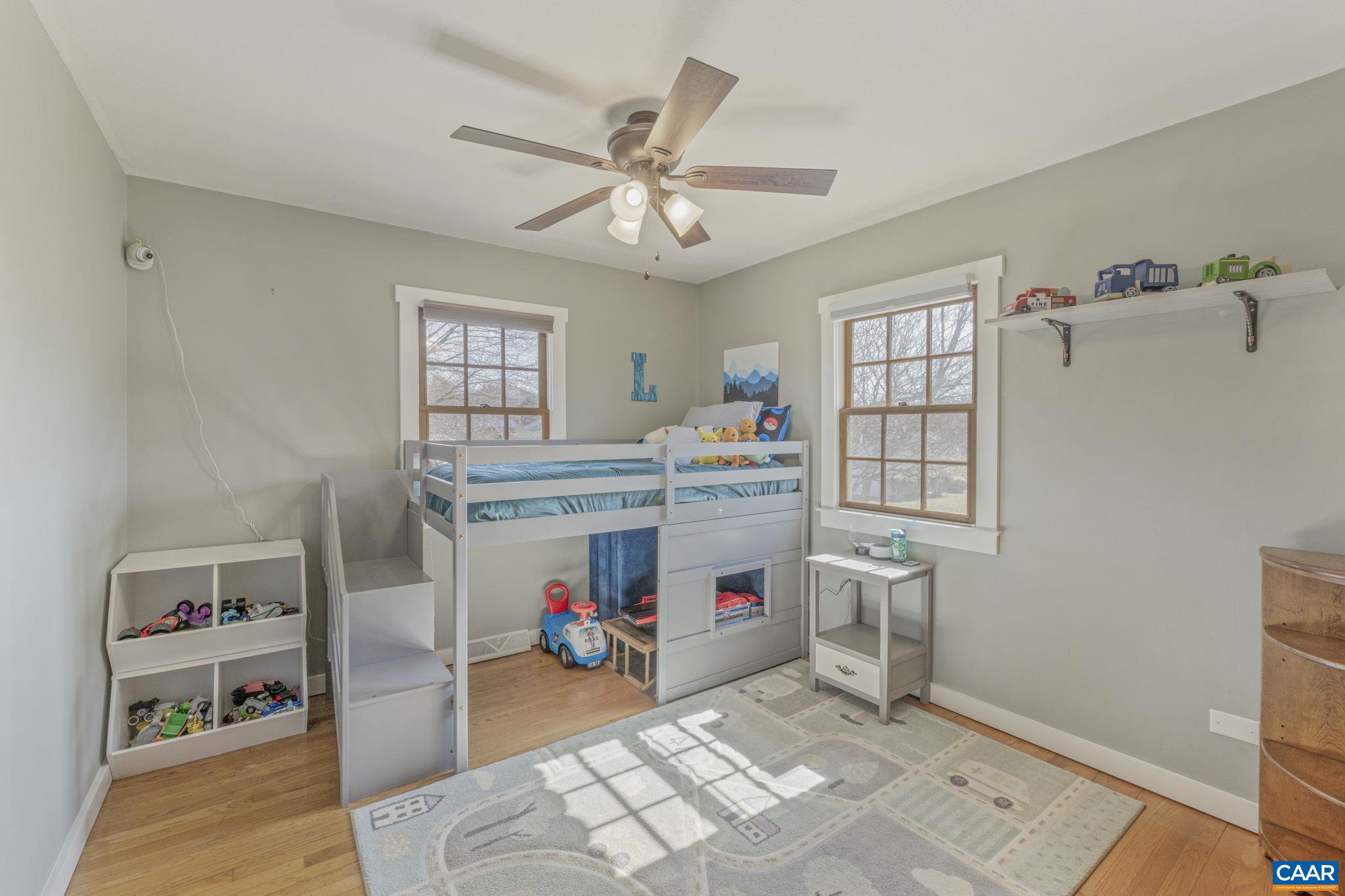 286 Madison Road Stanardsville, VA 22973 - Photo 15 of 48 a room with furniture a chandelier and a window