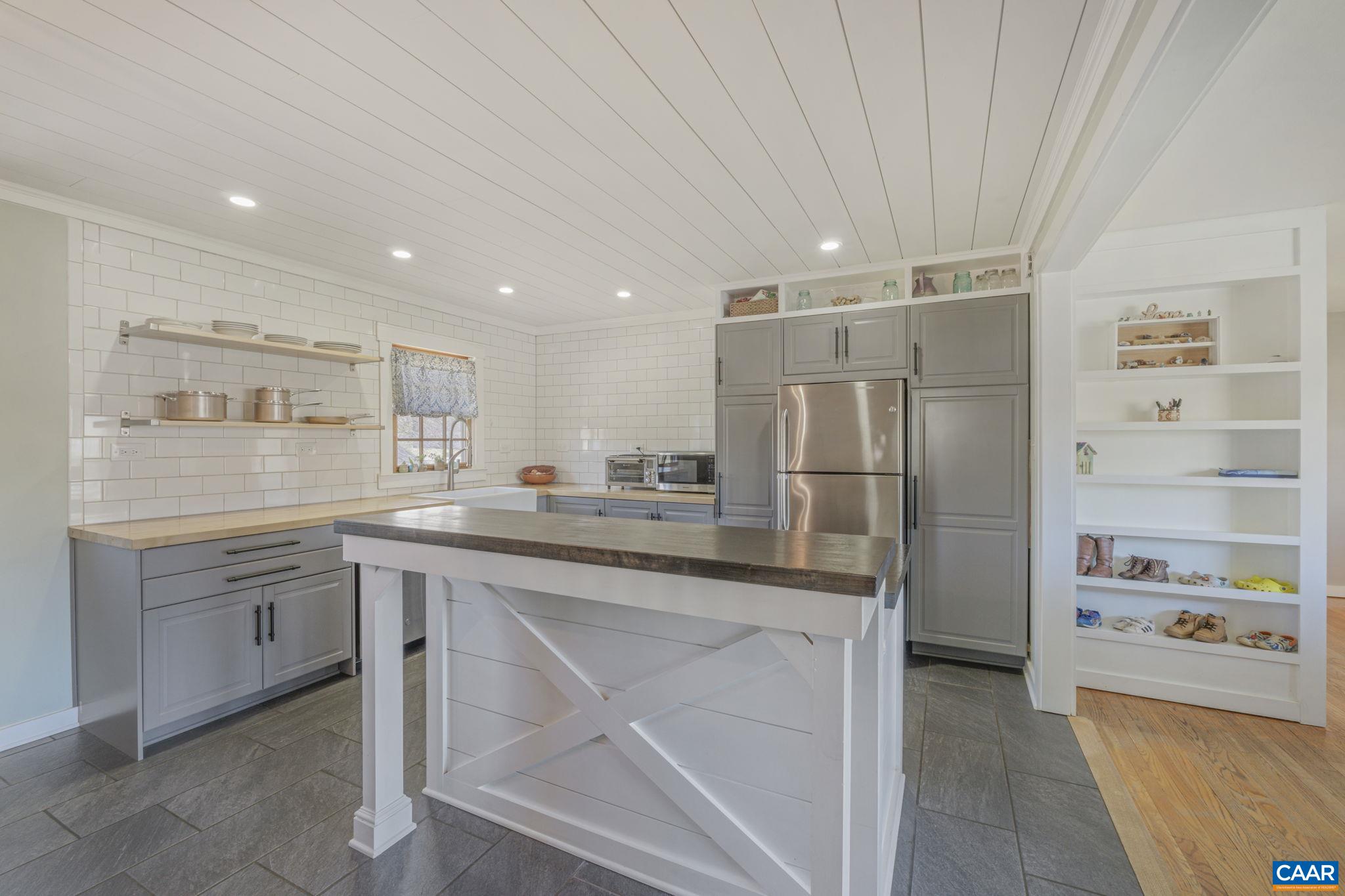 286 Madison Road Stanardsville, VA 22973 - Photo 2 of 48 a kitchen with counter top space and stainless steel appliances