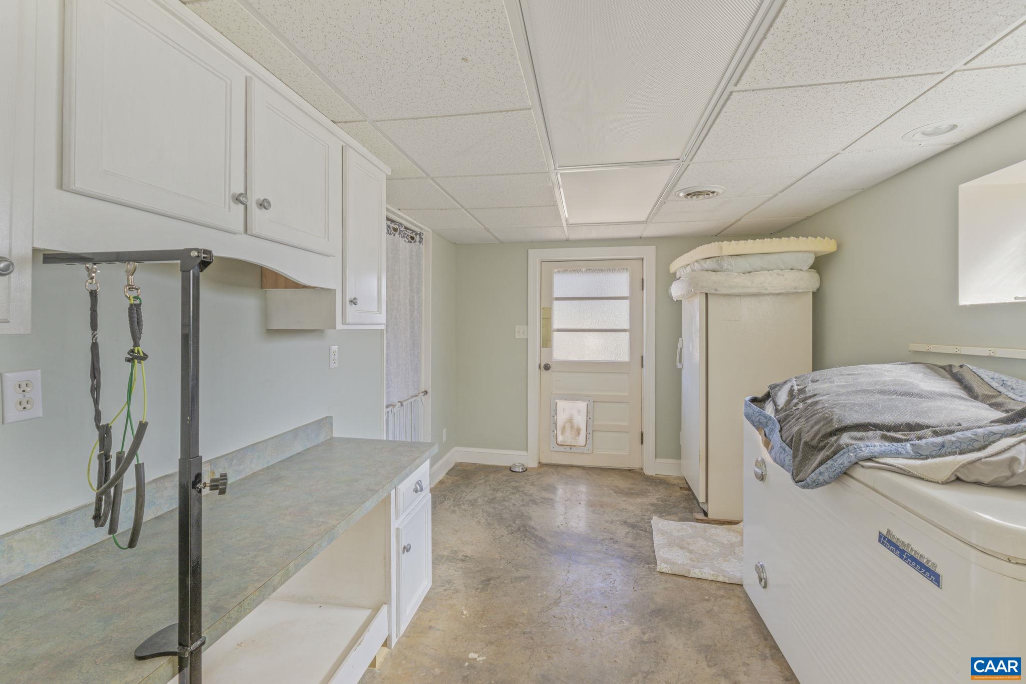 286 Madison Road Stanardsville, VA 22973 - Photo 21 of 48 a bedroom with a bed and a window