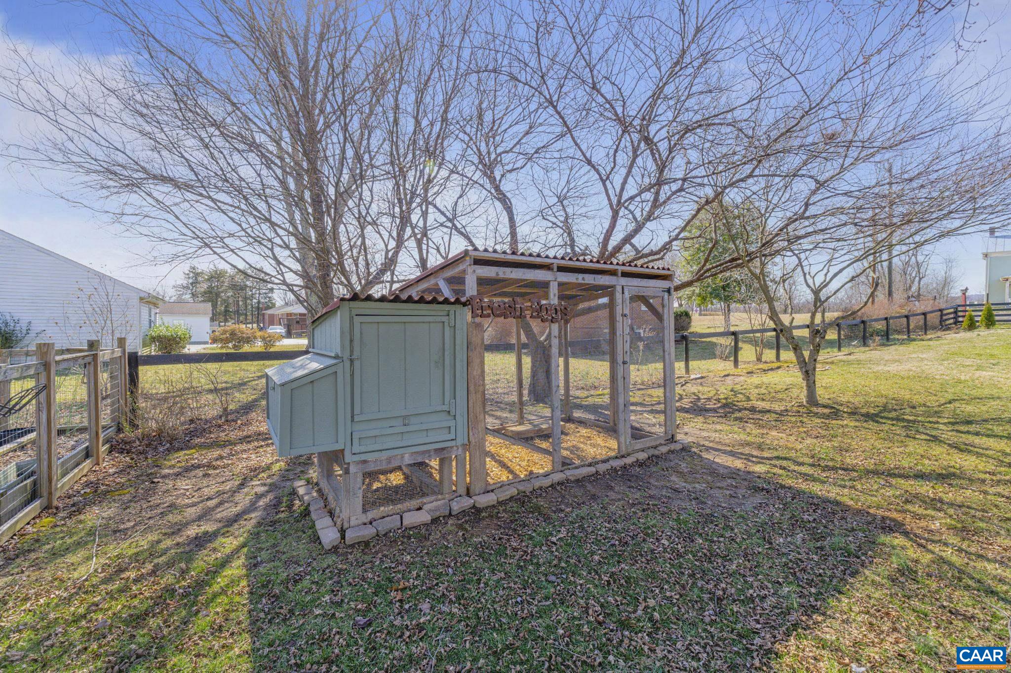 286 Madison Road Stanardsville, VA 22973 - Photo 31 of 48 a view of a backyard with wooden fence