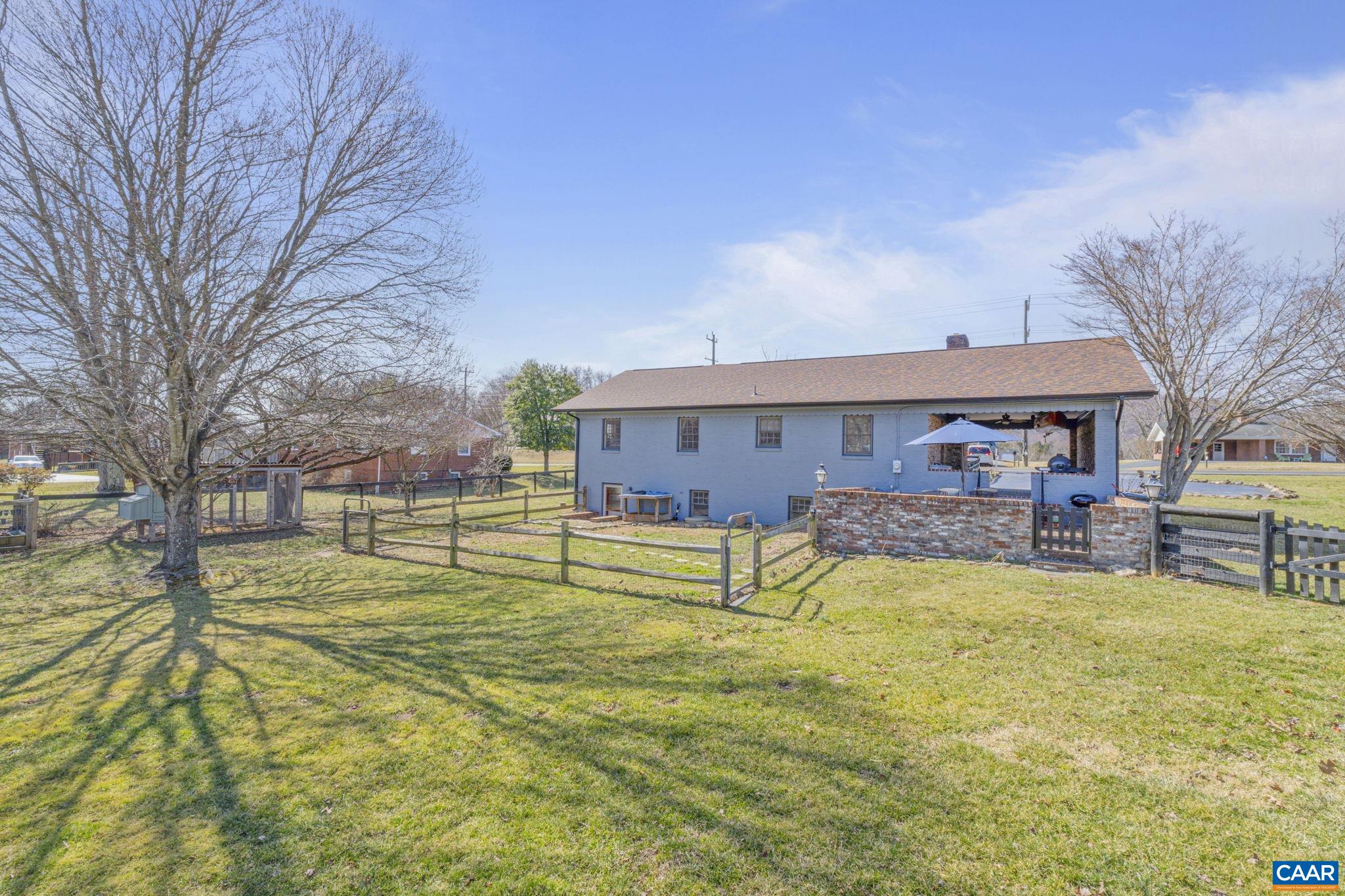 286 Madison Road Stanardsville, VA 22973 - Photo 40 of 48 a view of a house with swimming pool and sitting area