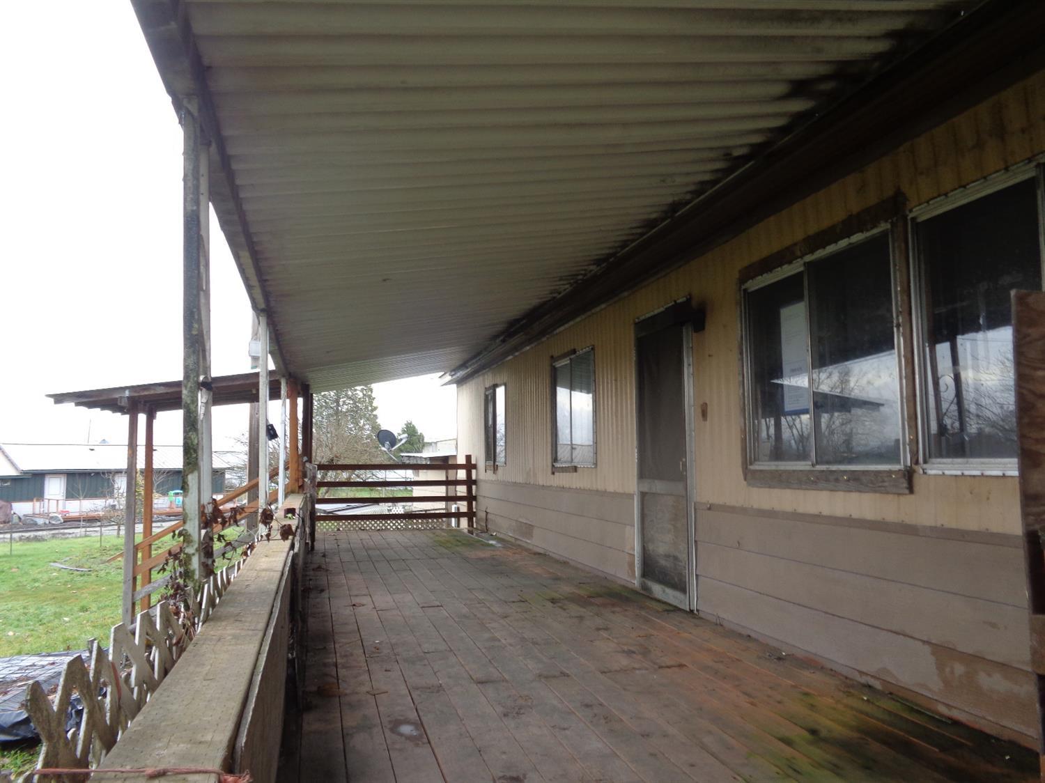 8213 Blackwell Road Central Point, OR 97502 - Photo 3 of 15 a view of an outdoor space with seating area