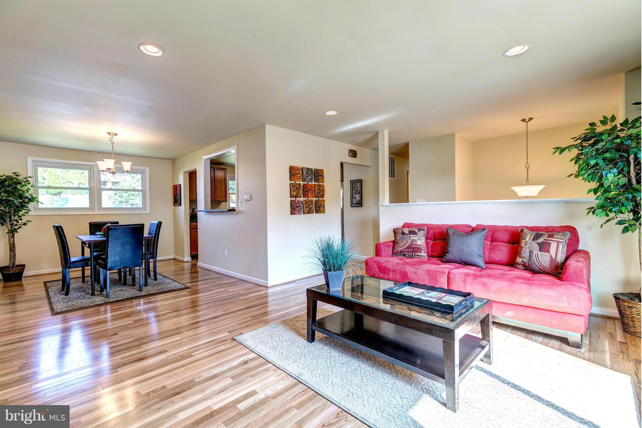 6711 Fox Meadow Road Baltimore, MD 21207 - Photo 30 of 30 a living room with furniture and wooden floor
