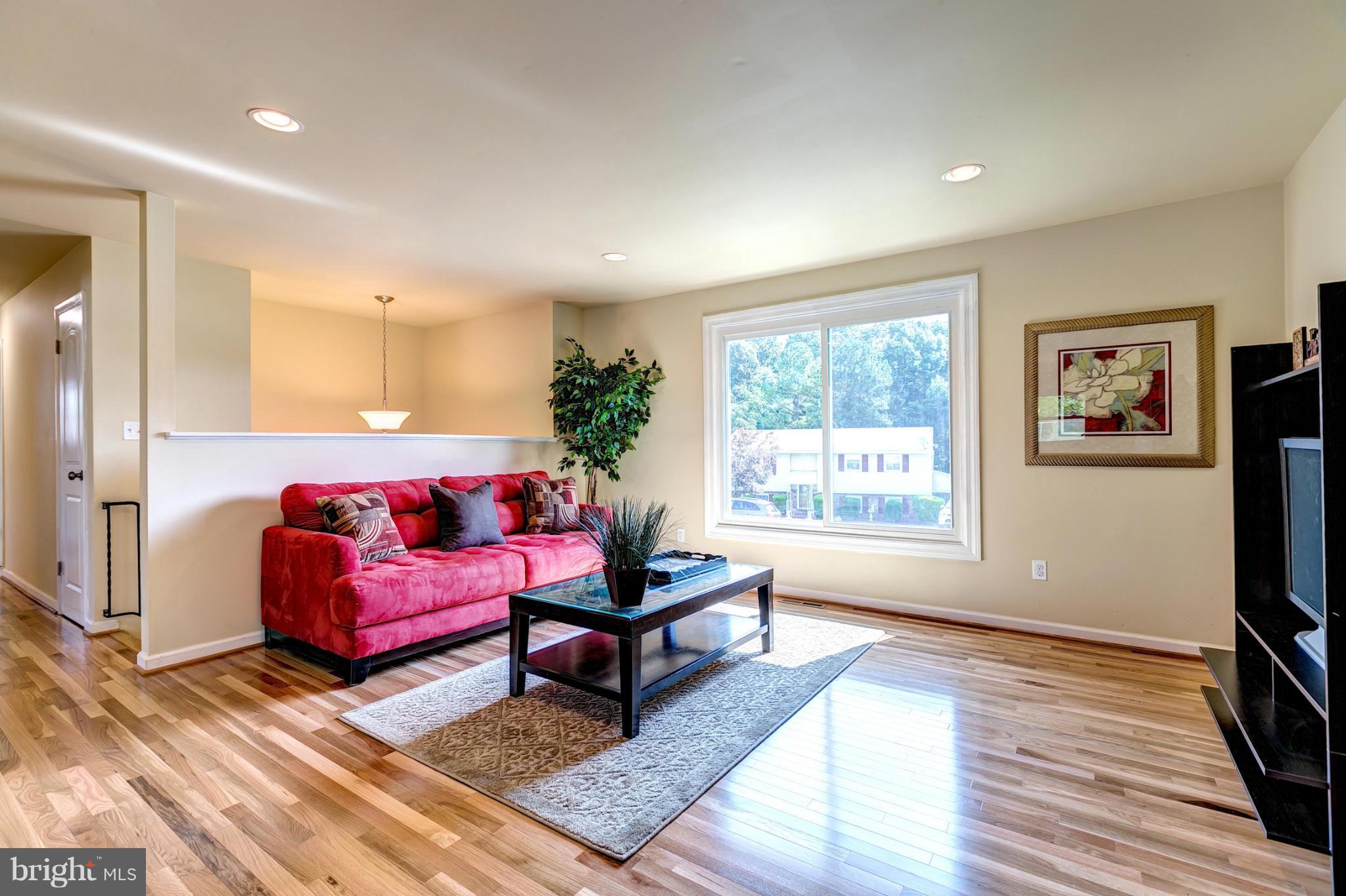 6711 Fox Meadow Road Baltimore, MD 21207 - Photo 2 of 30 a living room with furniture and a window