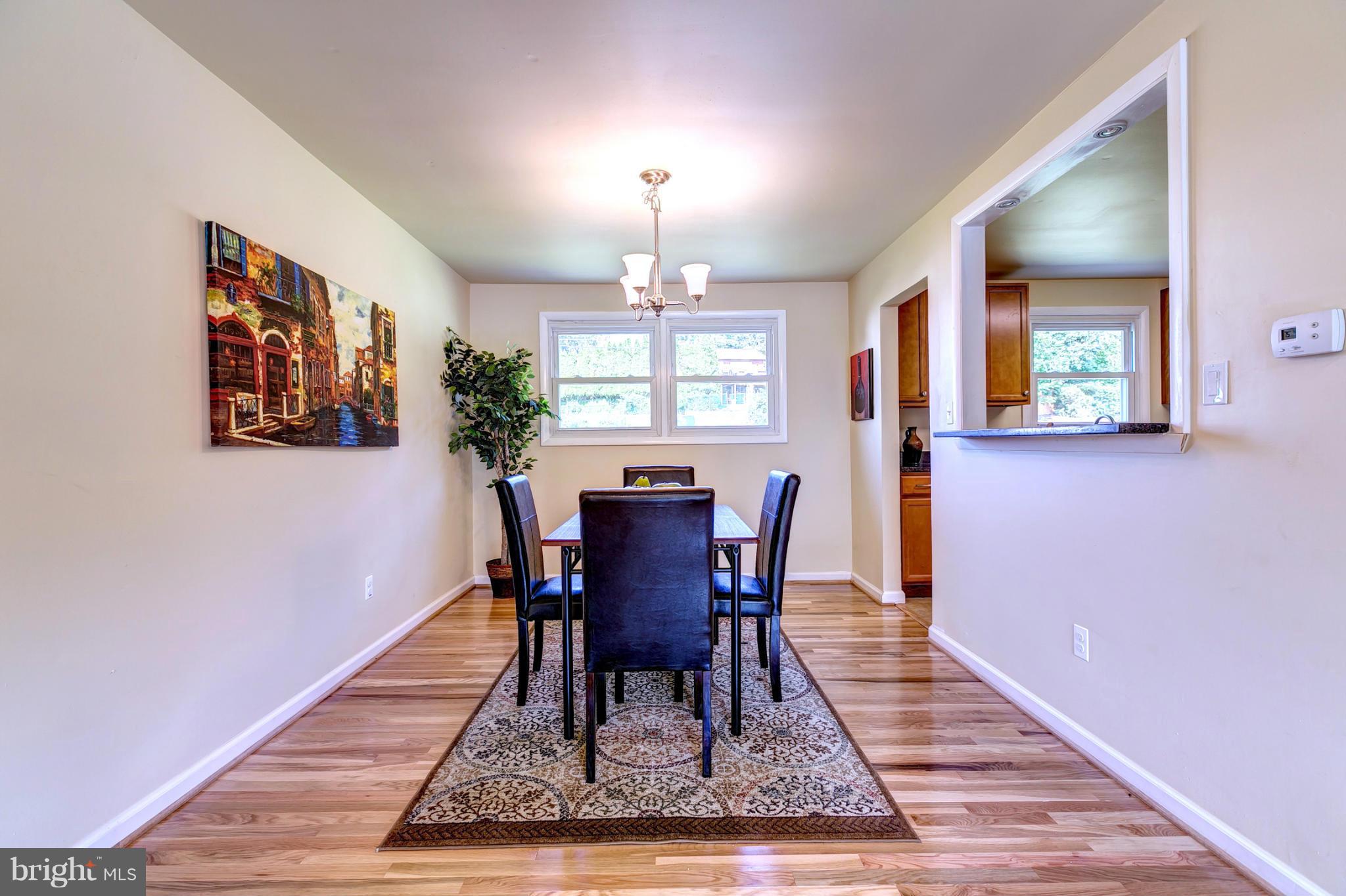 6711 Fox Meadow Road Baltimore, MD 21207 - Photo 5 of 30 a view of a dining room with furniture