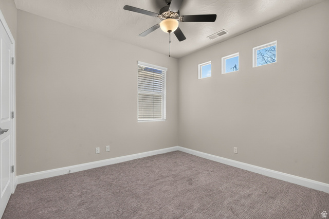 11 East 640 South Ivins, UT 84738 - Photo 34 of 44 Recessed lighting, ceiling fan with light fixture, carpeted flooring, window with blinds, and three upper square windows