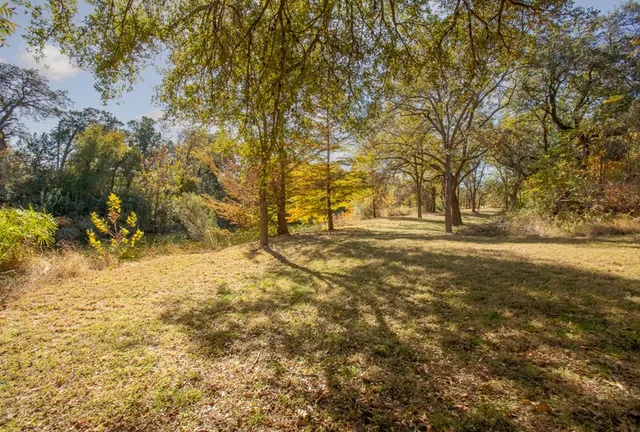 a view of a house with a swimming pool